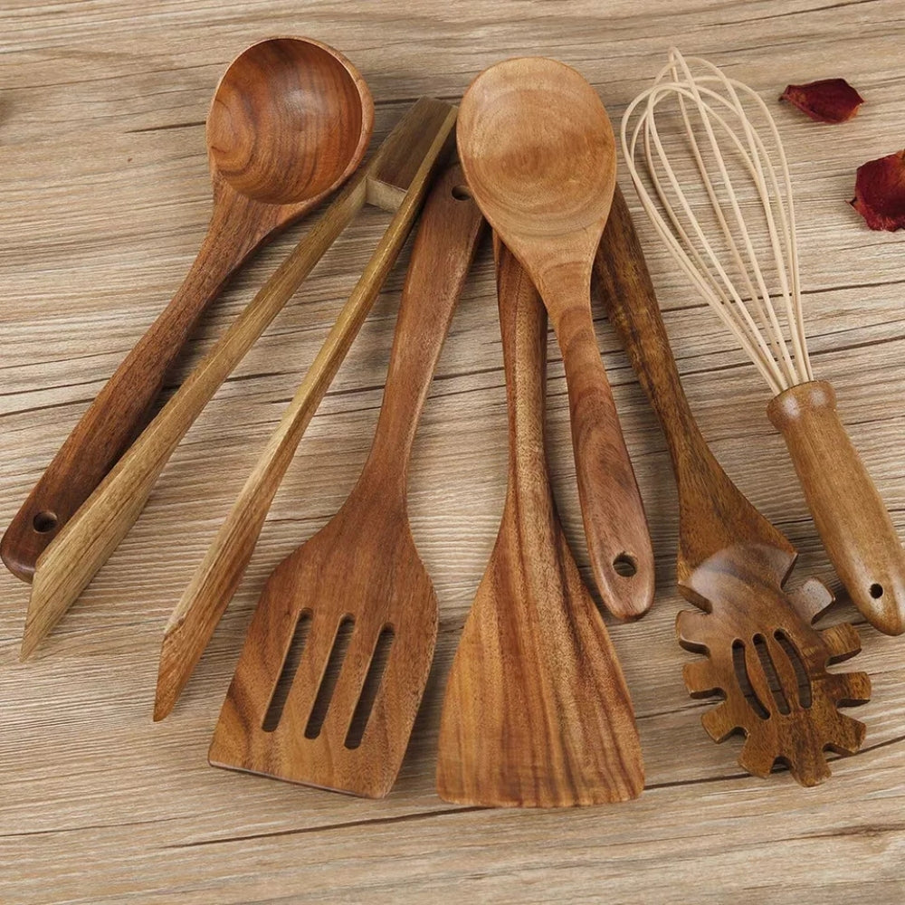 Wooden cooking utensils set flat lay