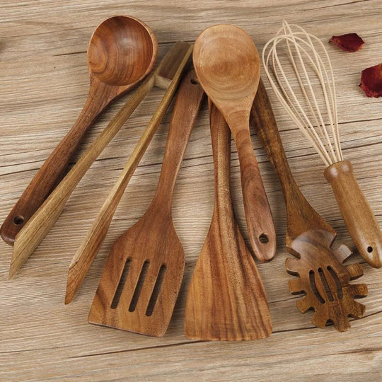 Wooden cooking utensils set flat lay