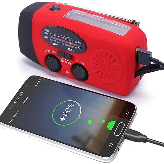 Emergency radio charging a phone via built-in power bank