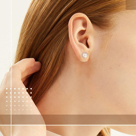 Diamond magnetic stud earring on ear