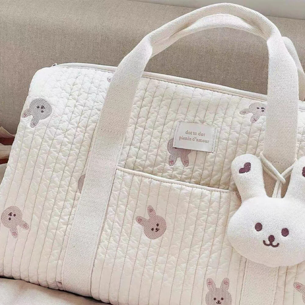 Bear print bag held