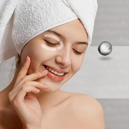 Woman using facial roller