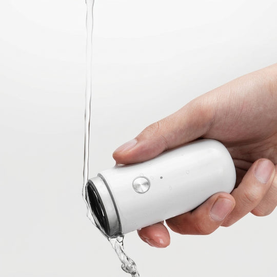 Waterproof shaver rinsed under running water