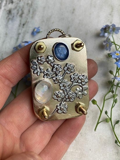 Mini flower press held in hand