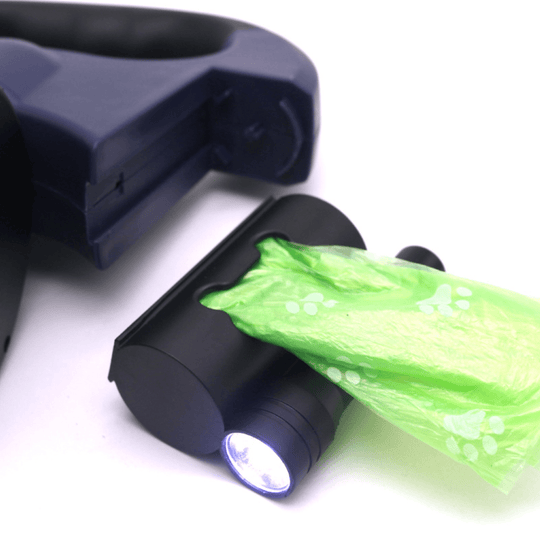 Dual dog leash with LED flashlight on