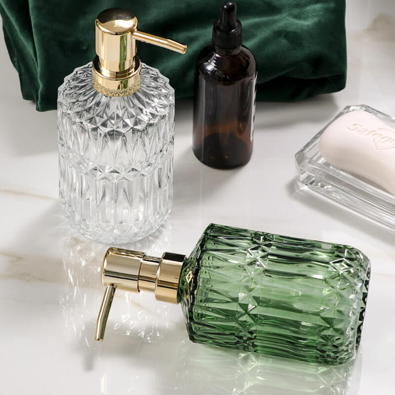 Green glass soap dispenser pair