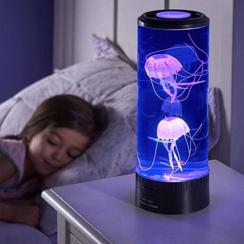 LED jellyfish lamp glowing blue on a nightstand