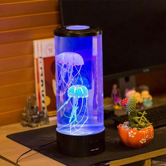 Jellyfish mood lamp glowing on a desk