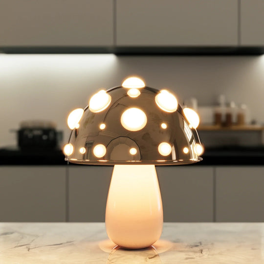 Gold mushroom lamp glowing on a kitchen counter