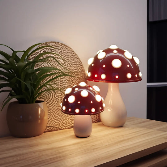 Red mushroom lamps on a wooden table