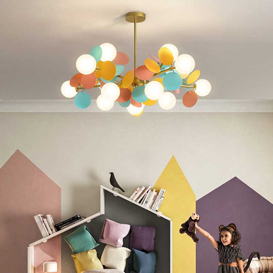 Branch LED chandelier above a children's room