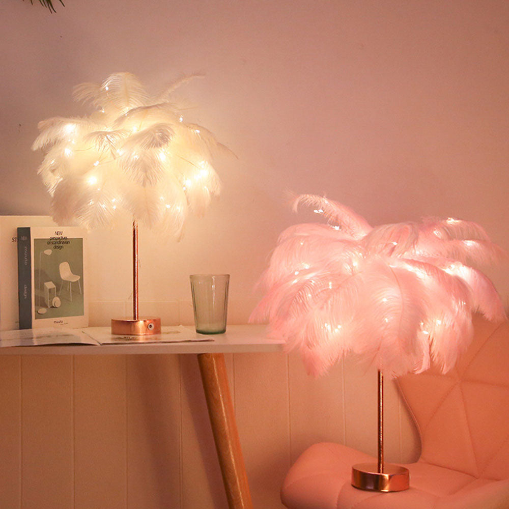 Pink feather table lamp glowing warmly