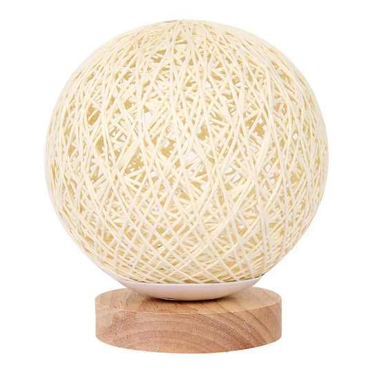 Beige woven rattan sphere table lamp