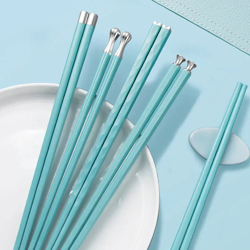 Blue chopsticks set on plate
