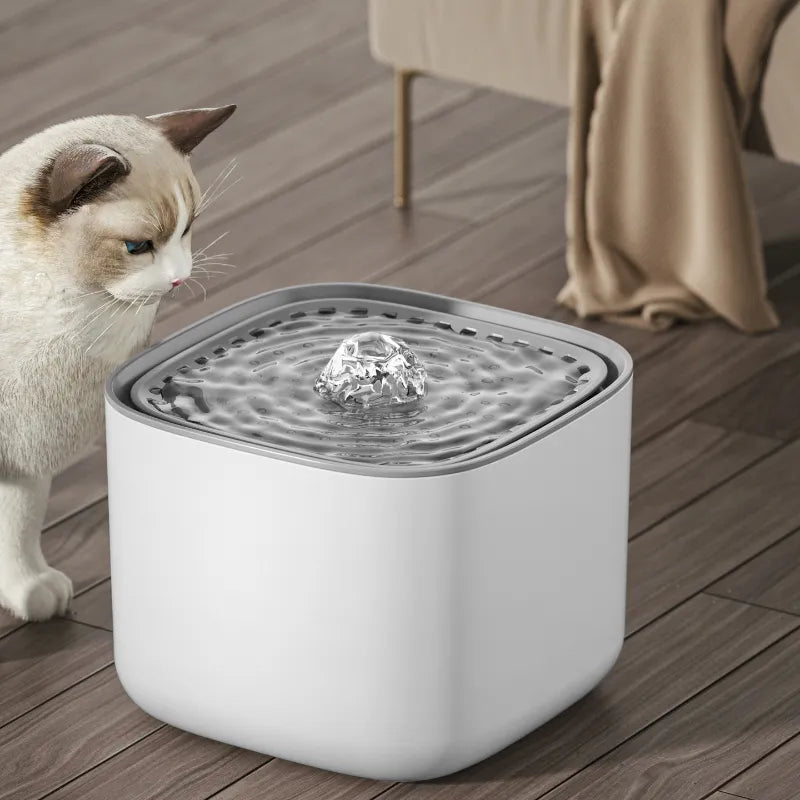 Pet water fountain plugged into USB outlet