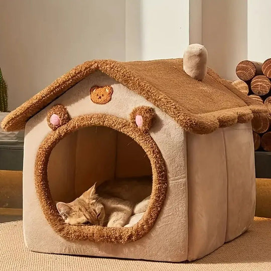Side view of plush pet house bed with sleeping cat