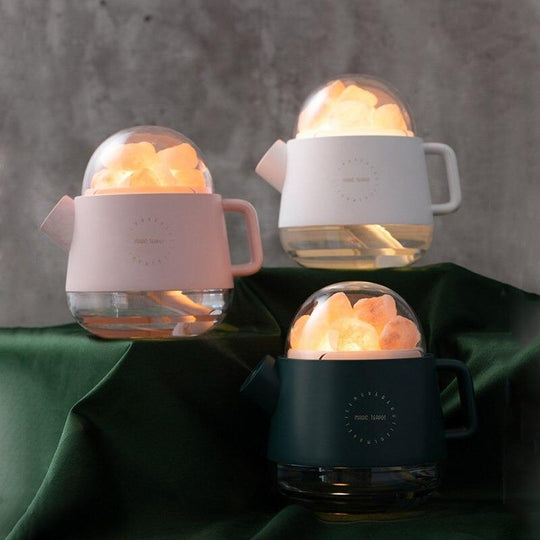 Green pink and white teapot humidifiers glowing