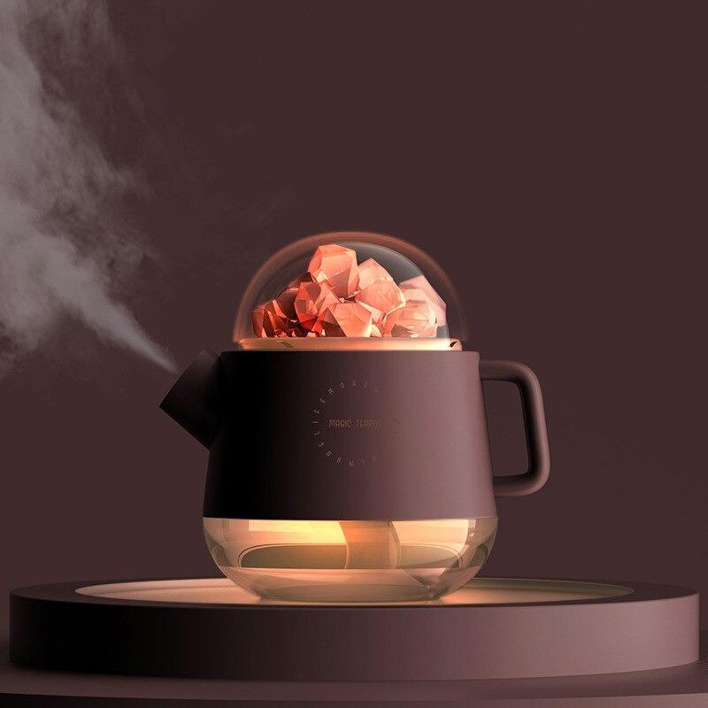 Teapot salt lamp humidifier glowing with mist