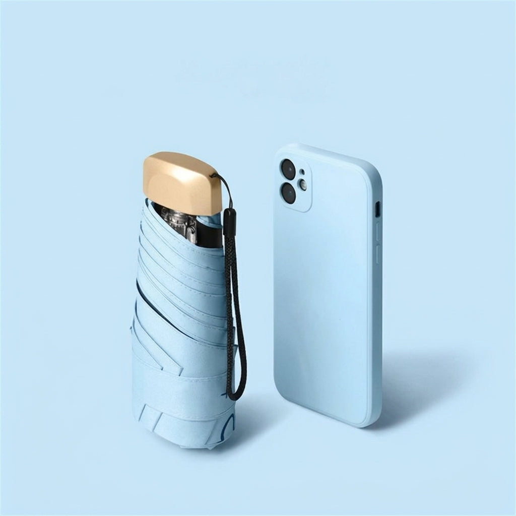Light blue folding umbrella