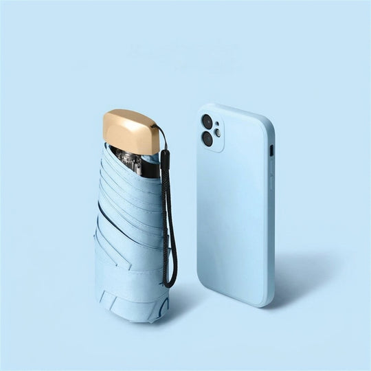 Light blue folding umbrella