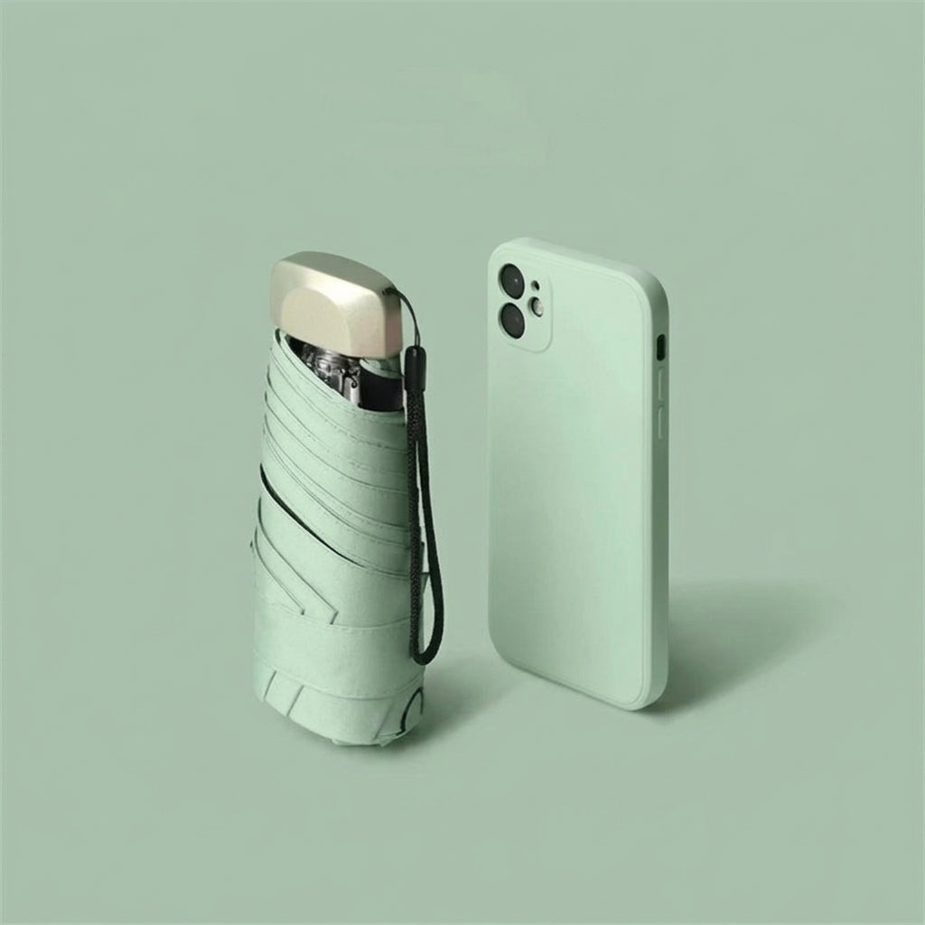 Mint green folding umbrella