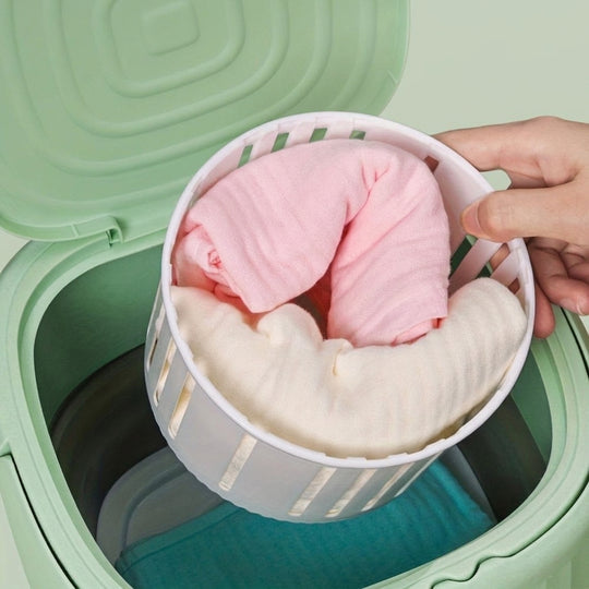 Light green portable washer with drainage basket