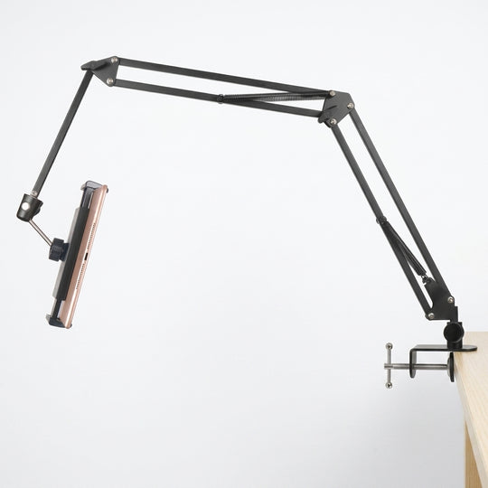Fully extended long arm tablet mount clamped to a desk