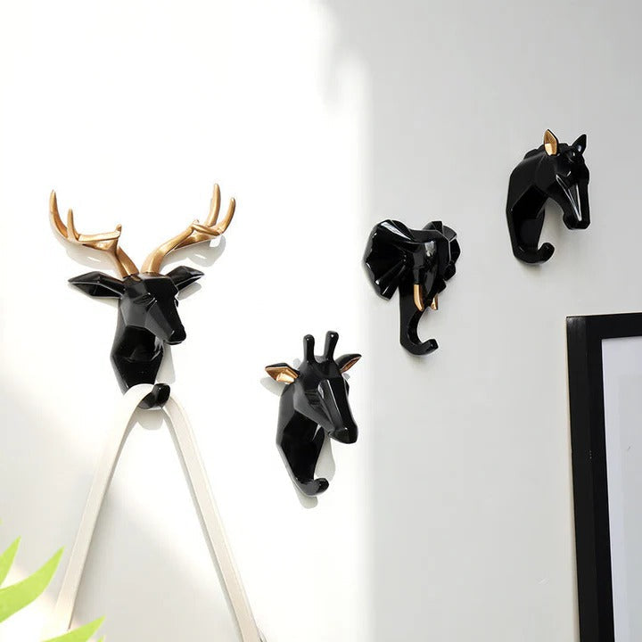 Black animal hooks on wall