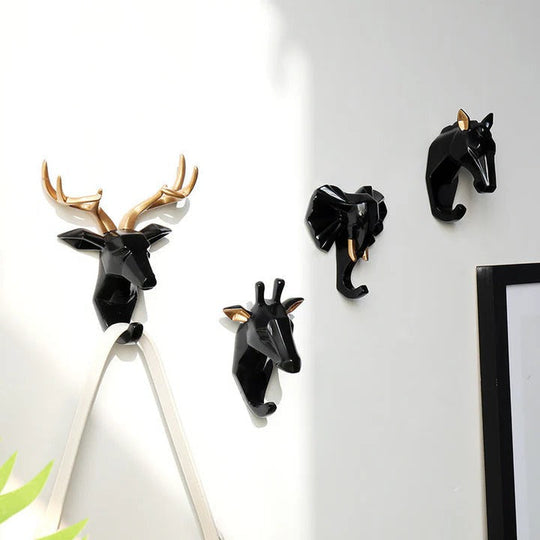 Black animal hooks on wall