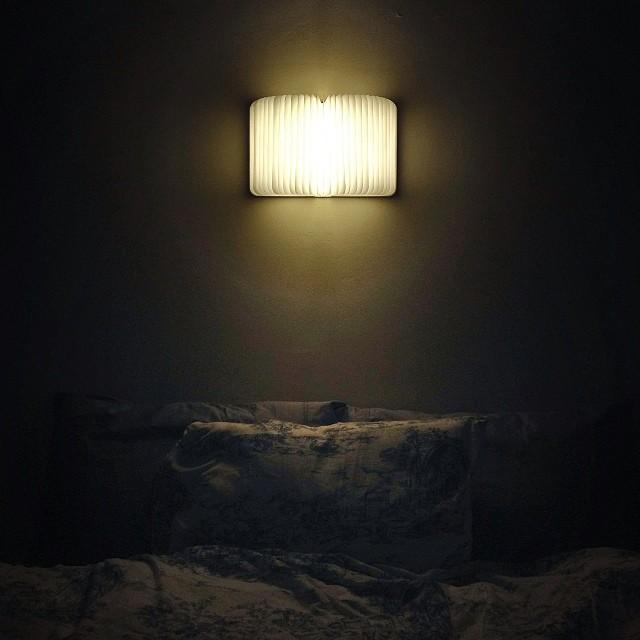 Book lamp glowing at night