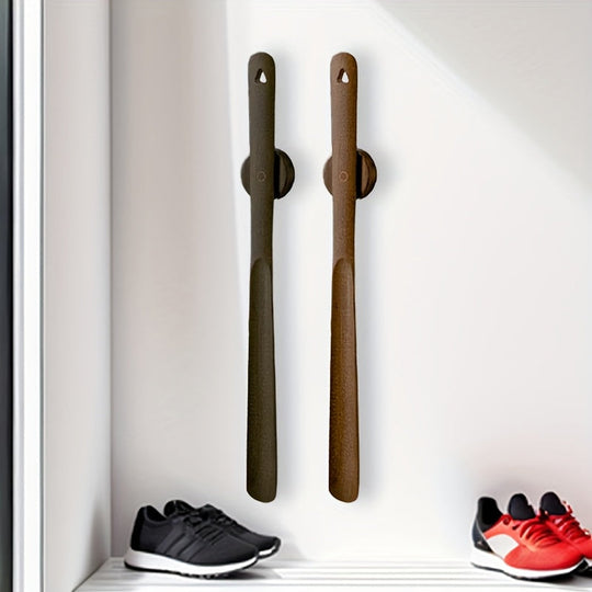 Wooden shoehorn hanging in entryway