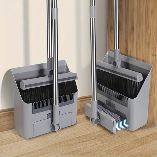 Broom and dustpan set standing in room