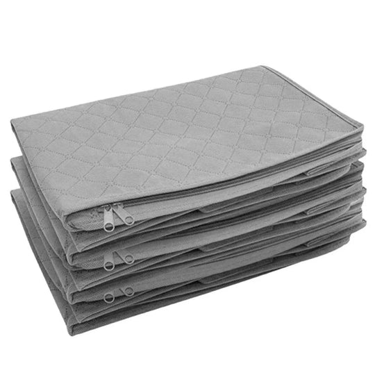 Folded grey storage bags stacked
