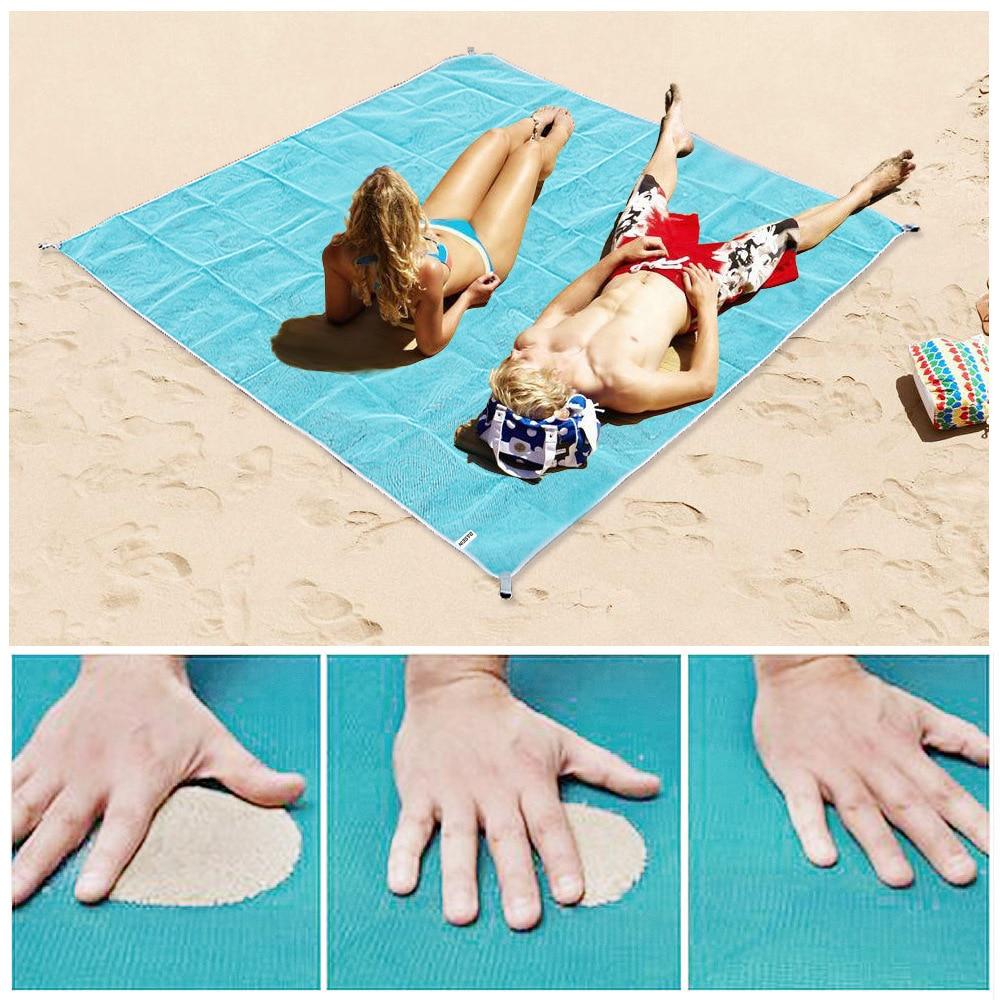 Blue sand-free blanket on the beach