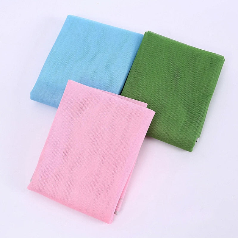 Sand-free mesh beach blanket in blue, green and pink