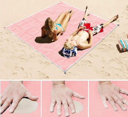 Pink sand-free blanket on the beach
