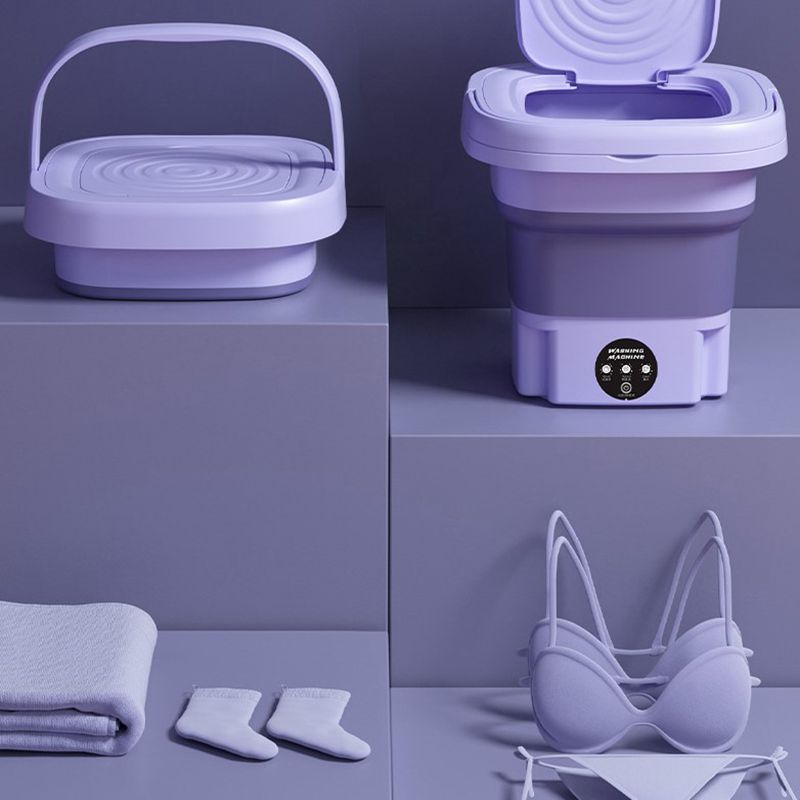 Purple portable washer with laundry