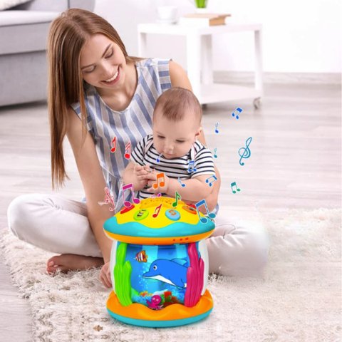 Mother and baby with sensory drum toy