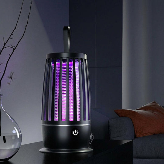 Mosquito killer lamp glowing on a living room table